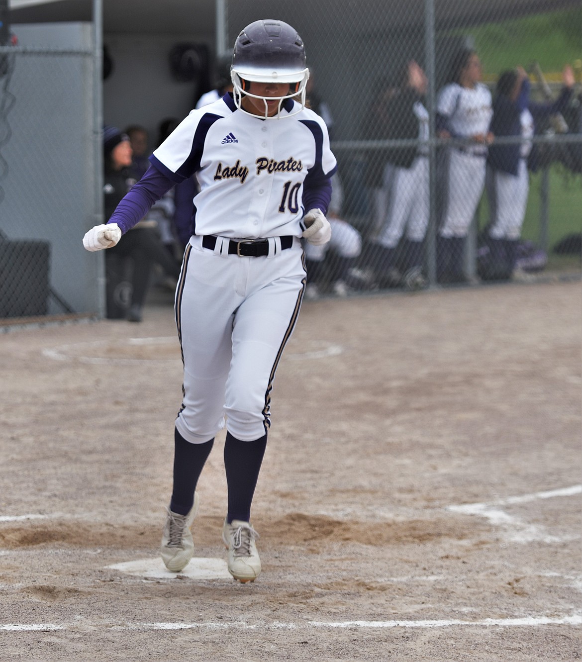 Jaivin Bad Bear scores a run against Columbia Falls. (Scot Heisel/Lake County Leader)