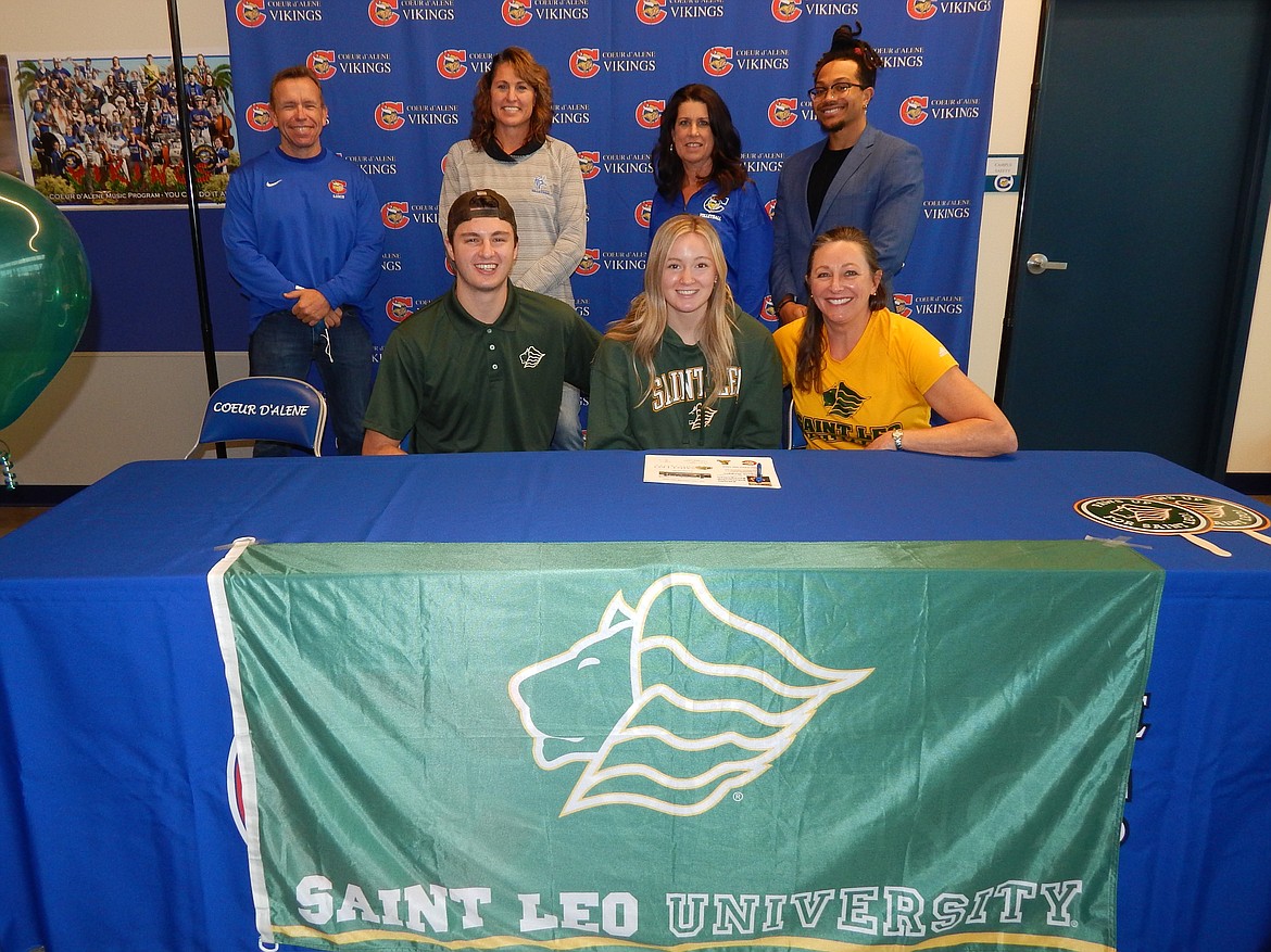 Courtesy photo
Coeur d'Alene High senior Angela Goggin recently signed a letter of intent to play volleyball at NCAA Division II St. Leo University in St. Leo, Fla. Seated from left are Michael Goggin (brother), Angela Goggin and Sandi Goggin (mom); and standing from left, Mike Randles, Coeur d'Alene High athletic director; Carly Curtis, Coeur d'Alene High head volleyball coach; Joyce Nida, Coeur d'Alene High assistant volleyball coach; and JJ Njoku, Coeur d'Alene High strength and conditioning coach.