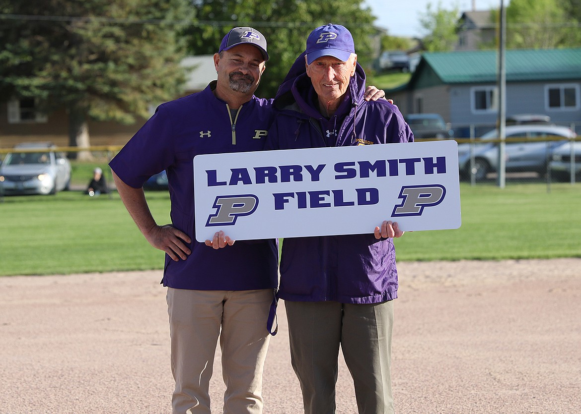 Polson High School Athletic Director Don Toth, left, poses with longtime Polson softball coach Larry Smith on May 18 at the Polson Softball Complex. Smith was honored with a ceremony, and the main field will now be known as Larry Smith Field. (Courtesy of Bob Gunderson)