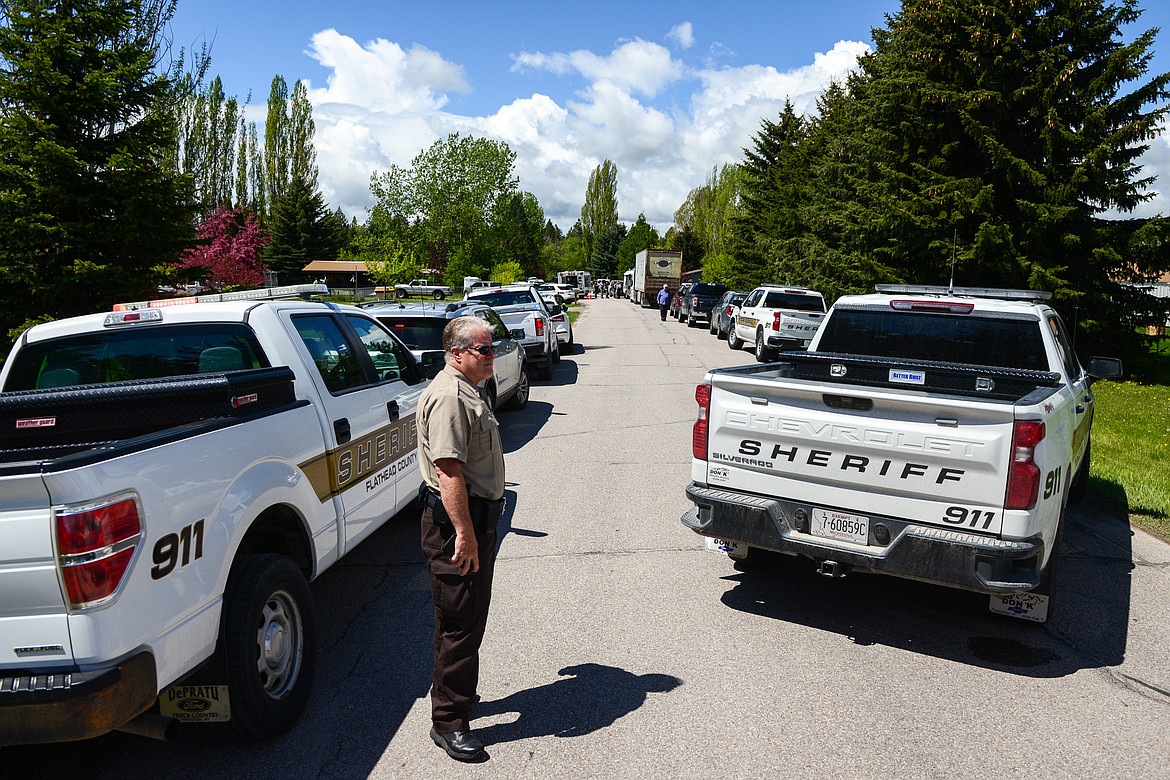 Law enforcement officers at the scene of a standoff in Columbia Falls on Wednesday. (Casey Kreider/Daily Inter Lake)