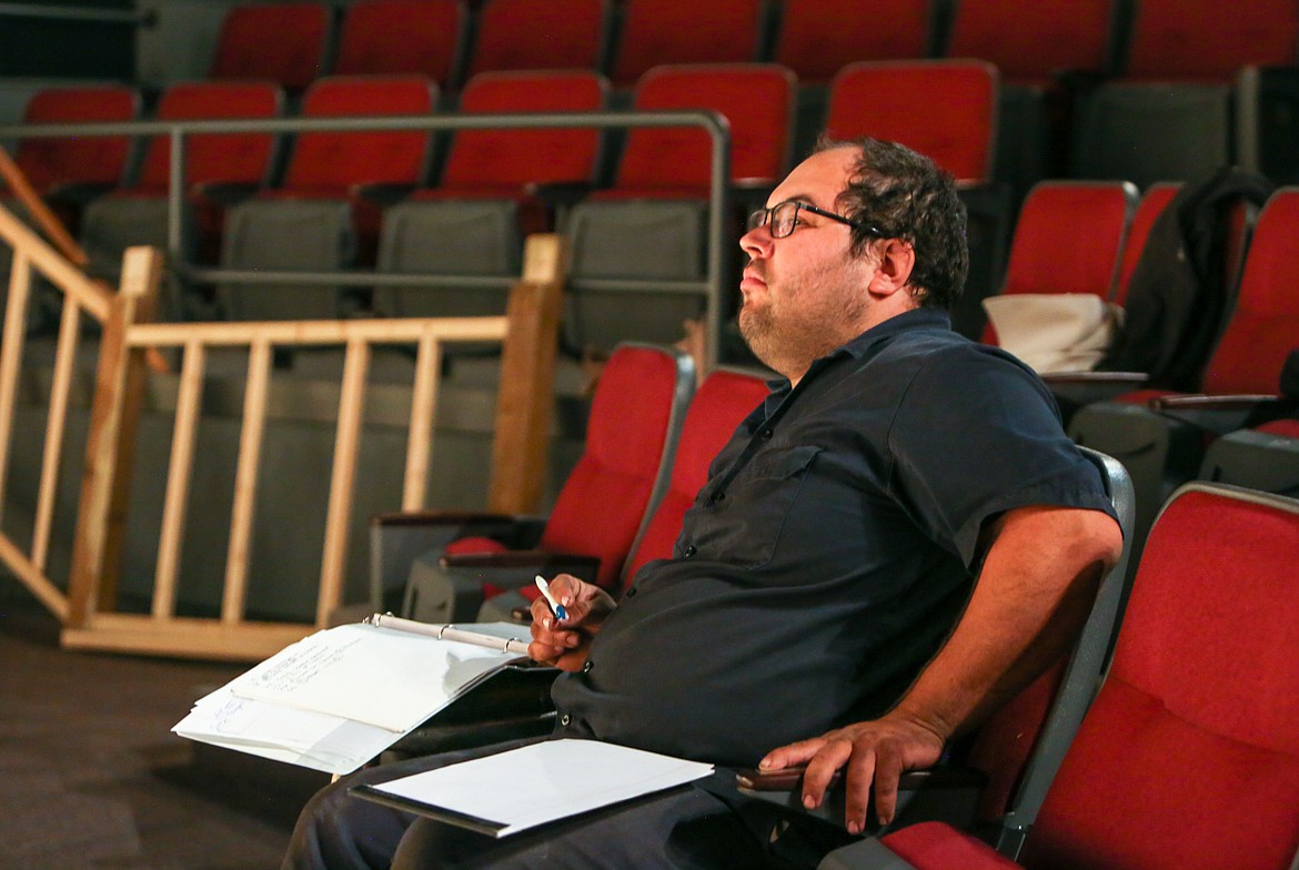 Jesse Huntwork watches the dress rehearsal Tuesday evening at Masquers Theater in Soap Lake. “Present Laughter” is Huntwork’s directorial debut.