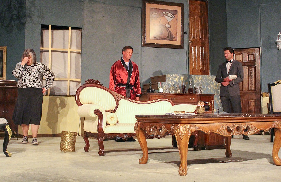 Left to right, Marla Allsopp, Greg Becker and Farmer Roseburg run through a scene on stage in dress rehearsal on Tuesday evening at Masquers Theater in Soap Lake ahead of opening night.