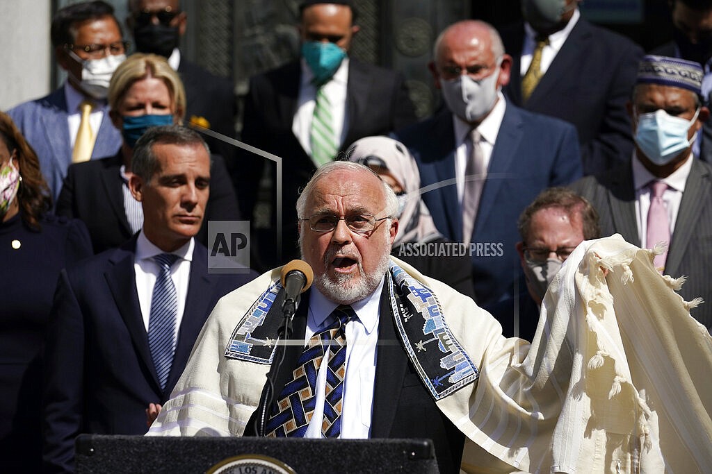 (AP Photo/Marcio Jose Sanchez)
Rabbi Abraham Cooper, center, of the Simon Wiesenthal Center, speaks in front of civic and faith leaders outside City Hall, Thursday, May 20, 2021, in Los Angeles. Faith and community leaders in Los Angeles called for peace, tolerance and unity in the wake of violence in the city that is being investigated as potential hate crimes.