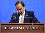 Boris Johnson defends virus record after ex-aide's attack