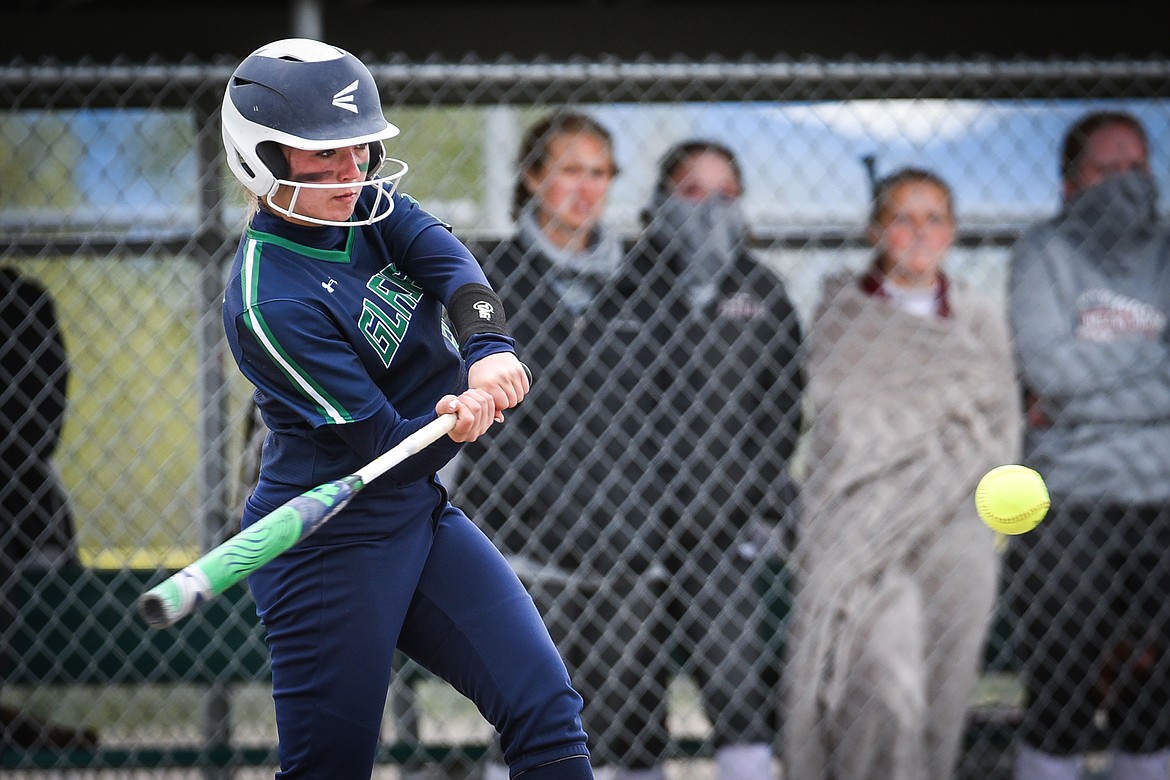 Glacier's Kenadie Goudette (20) singles in the first inning against Helena during the State Class AA Softball Tournament at Kidsports Complex on Friday. (Casey Kreider/Daily Inter Lake)