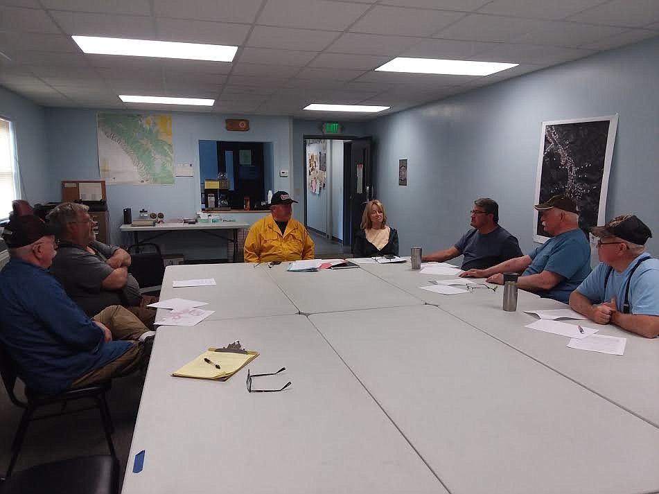 From left, are Carl Metcalf and Dan Fowler, two of the five commissioners for the Superior Rural Fire District, Steve Temple, Superior Volunteer Fire District Chief, Mary Jo Lommen, Mineral County Fire Marshall, Dave Asay, Dan Arnsan and Ken Quitt, the other three commissioners. (Monte Turner/Mineral Independent)