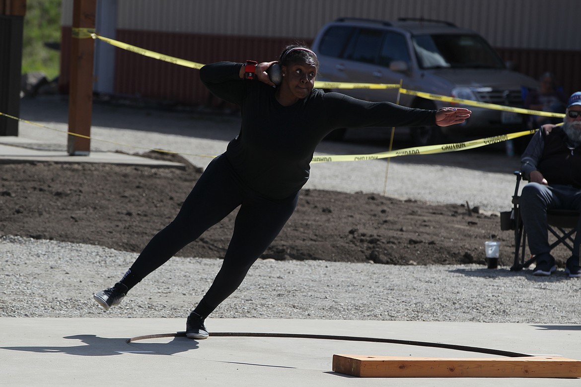 JASON ELLIOTT/Press
Rachel Fatherly, a Penn State product, releases a throw during the women's shot put during the Iron Wood Throws Classic in Rathdrum. Fatherly won the event for the second straight day, winning with a throw of 59 feet, 9 inches on Saturday.