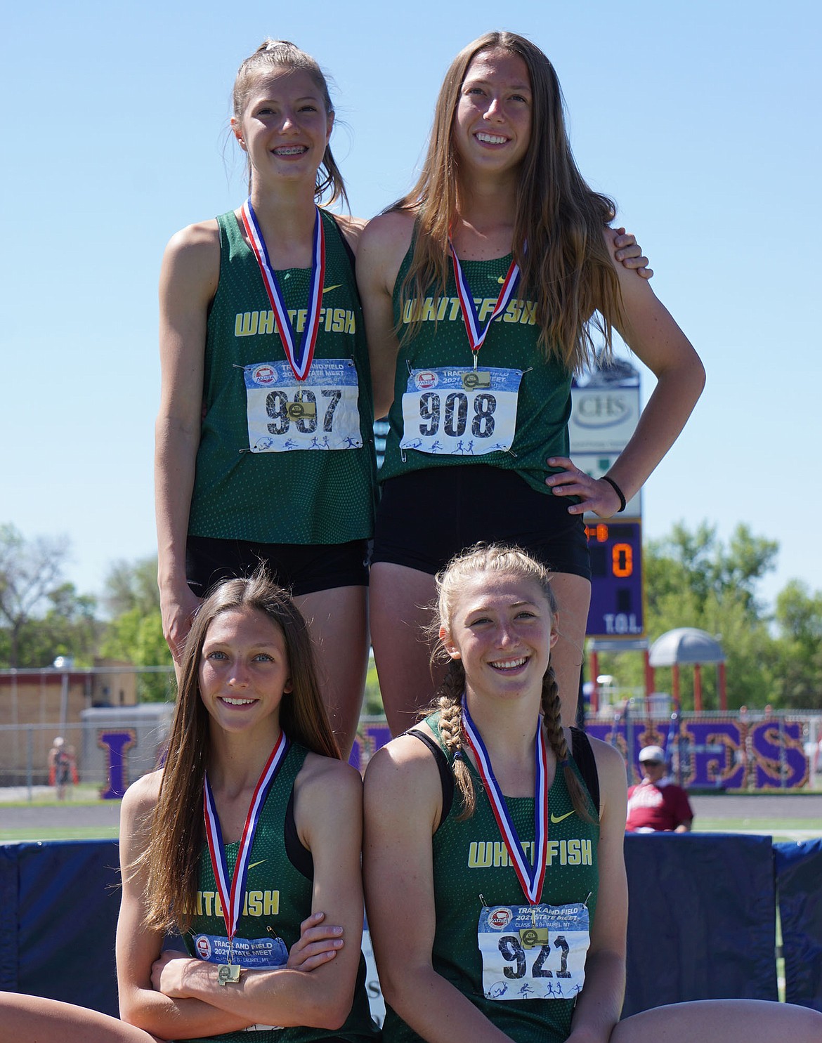 The Whitefish women’s 4x100 relay earned the state championship at the Class A state track meet at Laurel. On the podium, top from left, are Hailey Ells, Mikenna Ells; on bottom, Erin Wilde and Brook Zetooney. (Matt Weller photo)