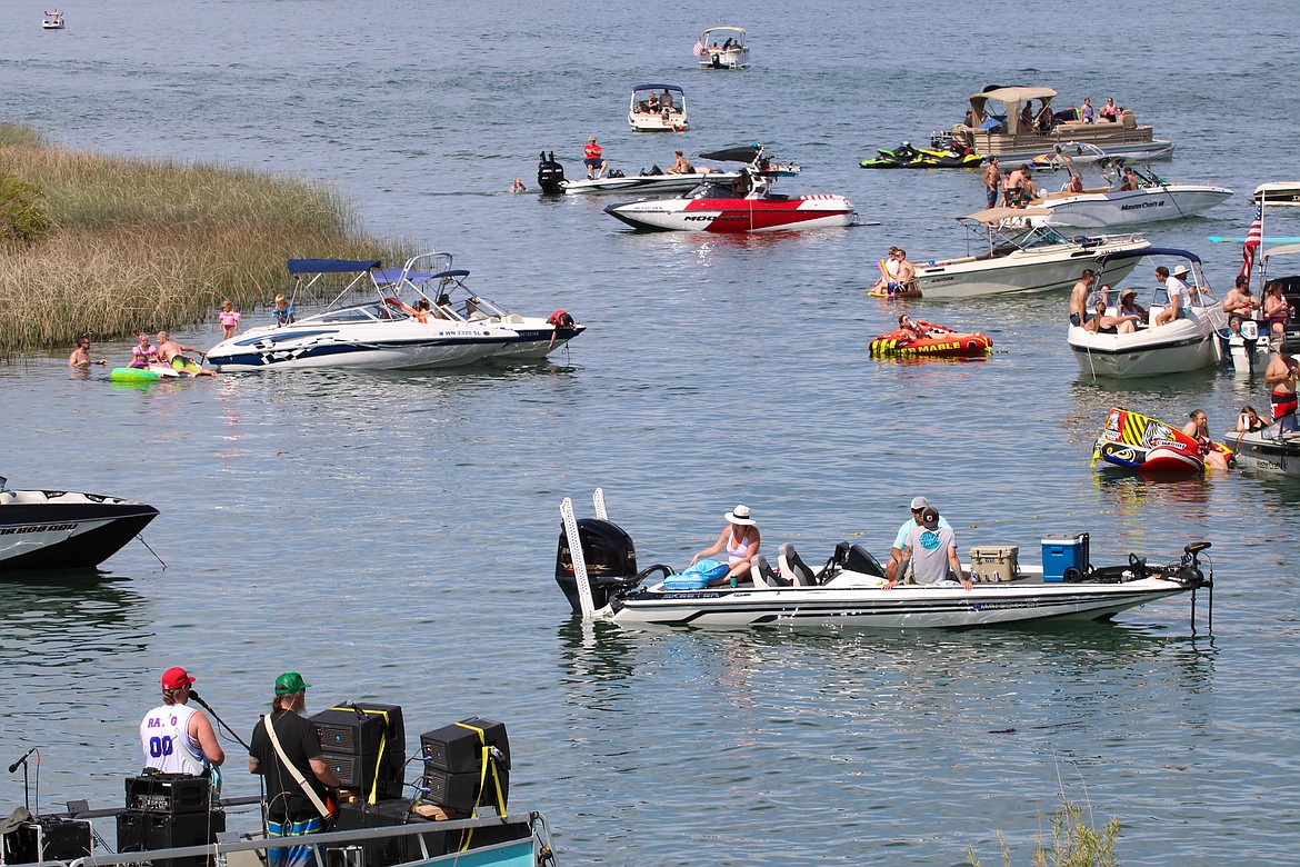 About 100 boats pulled up for the Dimestore Prophet's 5th Tunes at the Dunes in Moses Lake.