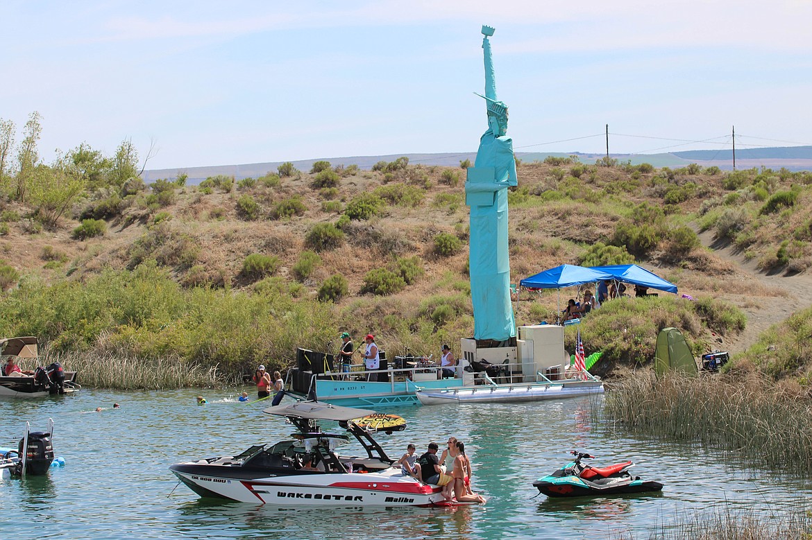 Mick Hansen's Statue of Liberty sculpture became a beacon for Dimestore Prophet's 5th somewhat annual Tunes at the Dunes in Moses Lake.