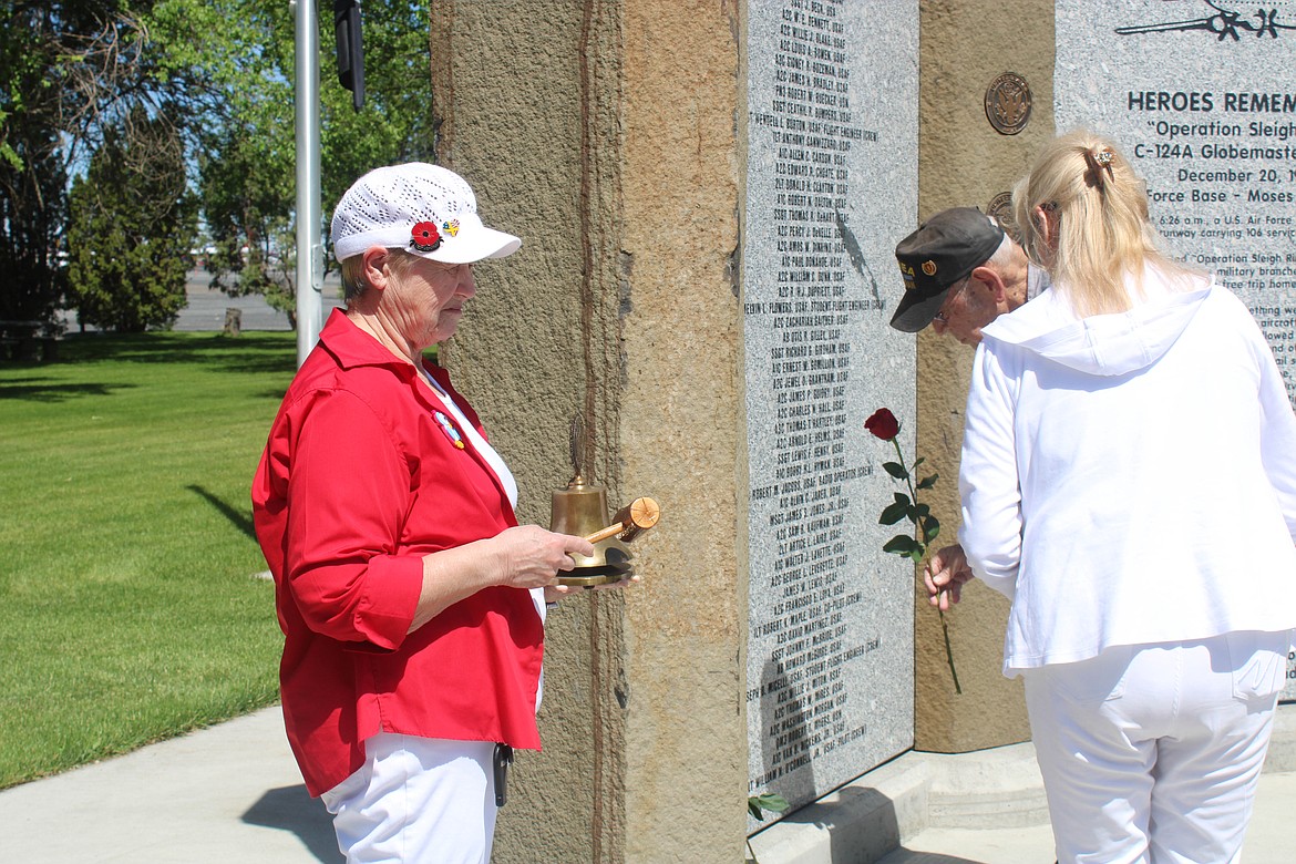 Ruezhan Rogers rings the Bell of Honor 87 times, one for each person listed on the 87 Fallen Heroes Memorial, then seven more times for those who have responded, served, protected, defended, sacrificed, suffered and lost their life at the Memorial Day service in Moses Lake.