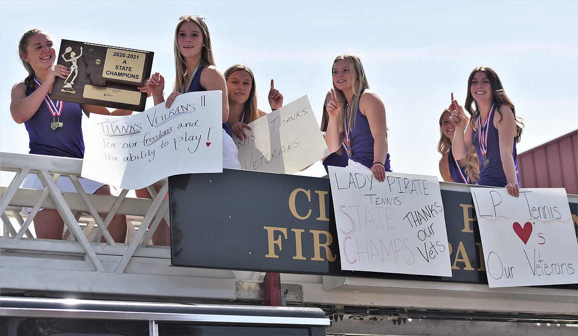 The Class A state champion Polson girls tennis team participated in a Memorial Day parade Monday. (Scot Heisel/Lake County Leader)
