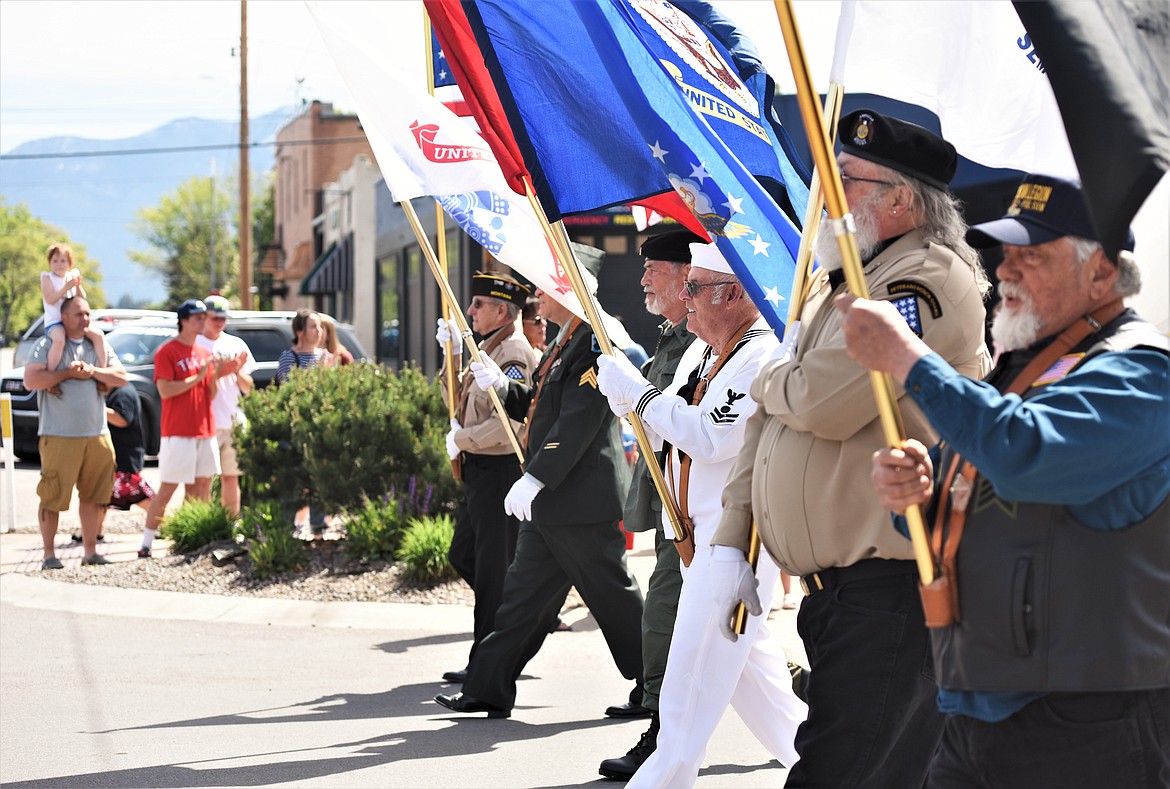 A Memorial Day parade marches down Main Street and to the Lake County Courthouse. (Scot Heisel/Lake County Leader file photo)