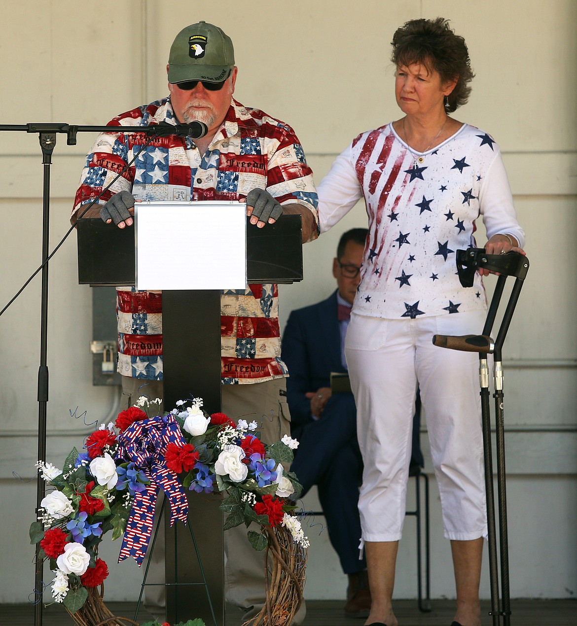 John Holley, with wife Stacey at his side, speaks during the Memorial Day ceremony at McIntire Family Park.