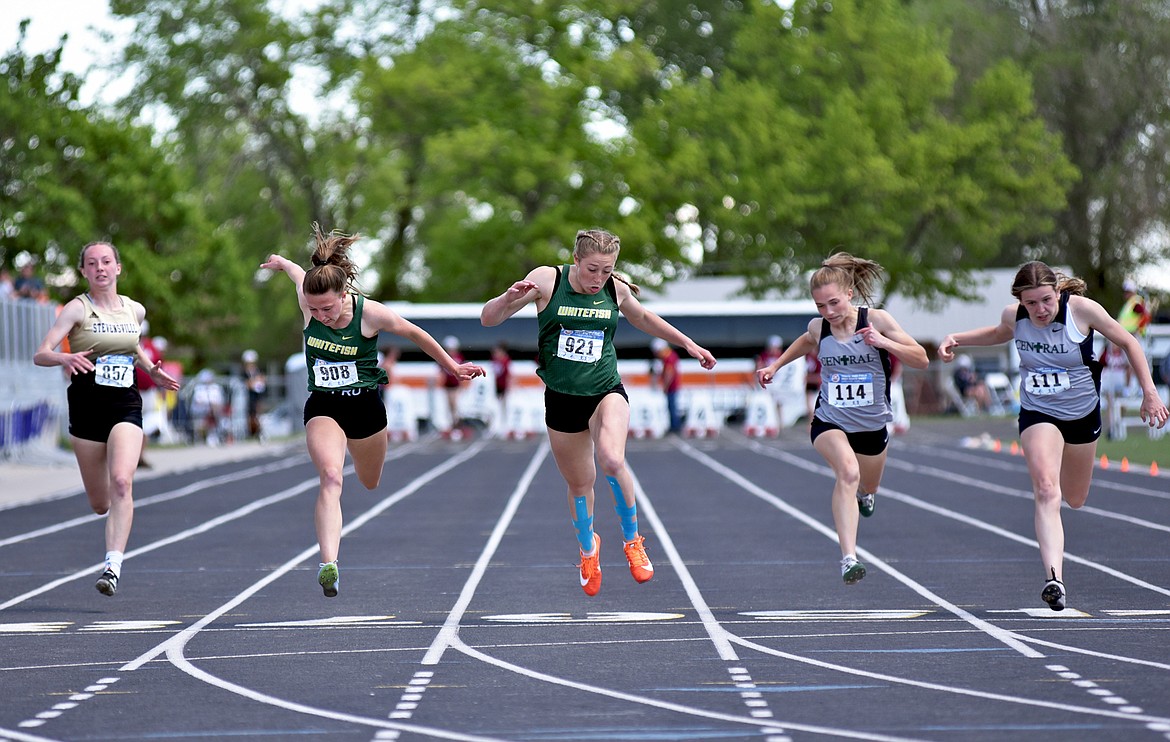 Whitefish freshman Brooke Zetooney edges her teammate Mikenna Ells in the 100 meter dash finals at the Montana Class A-B State Track and Field Meet in Laurel on Saturday. (Whitney England/Whitefish Pilot)