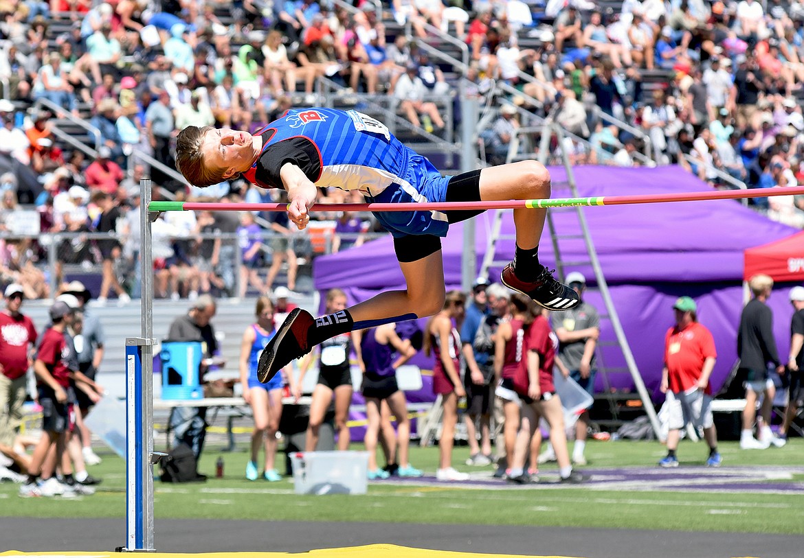 Wyatt Dukes leaps to a third-place finish in the high jump at the state track meet in Laurel Saturday.
Whitney England/For the Eagle