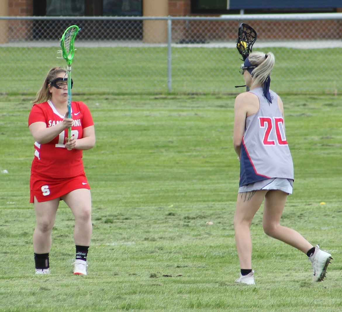 Chandler Sanborn defends a Mead player during a recent game.