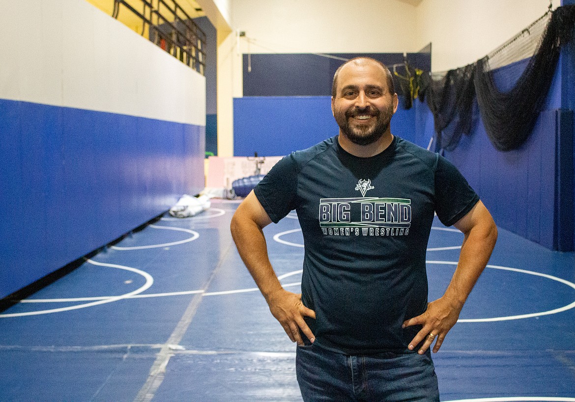 Big Bend head women's wrestling coach Bryan Seibel stands on the mat in the wrestling room at the ATEC Building on campus on Tuesday afternoon in Moses Lake.