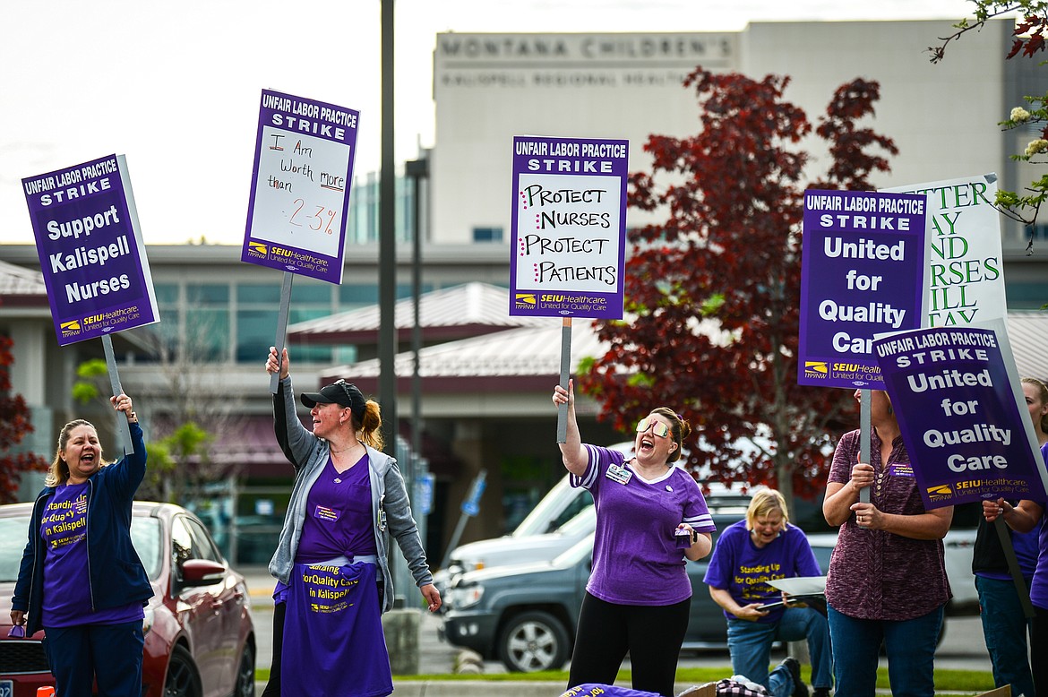 Nurses affiliated with SEIU Healthcare 1199NW and supporters march and hold signs during a strike outside Logan Health in Kalispell on Tuesday, June 1, 2021. (Casey Kreider/Daily Inter Lake)