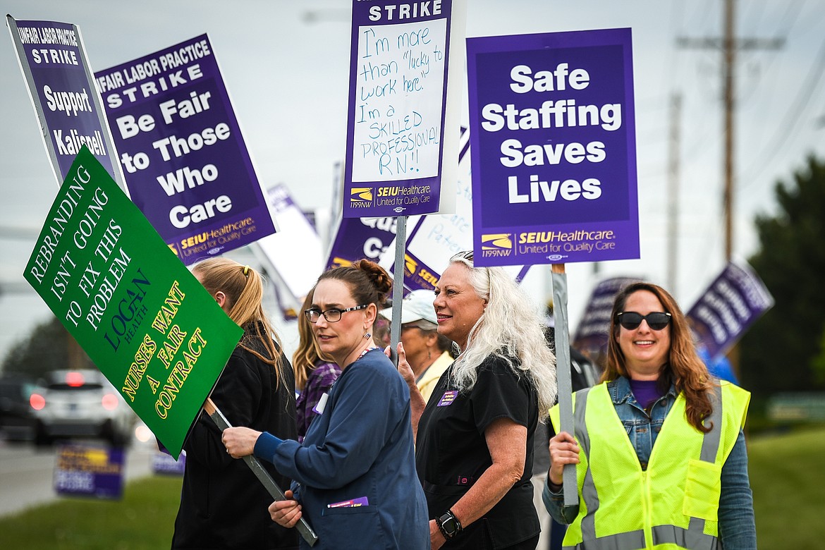 Nurses affiliated with SEIU Healthcare 1199NW and supporters march and hold signs during a strike outside Logan Health in Kalispell on Tuesday, June 1, 2021. (Casey Kreider/Daily Inter Lake)