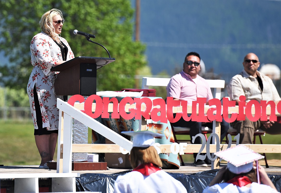 Family consumer and science teacher Leslie Jackson delivers the keynote speech during Arlee High School's graduation ceremony Sunday. (Scot Heisel/Lake County Leader)