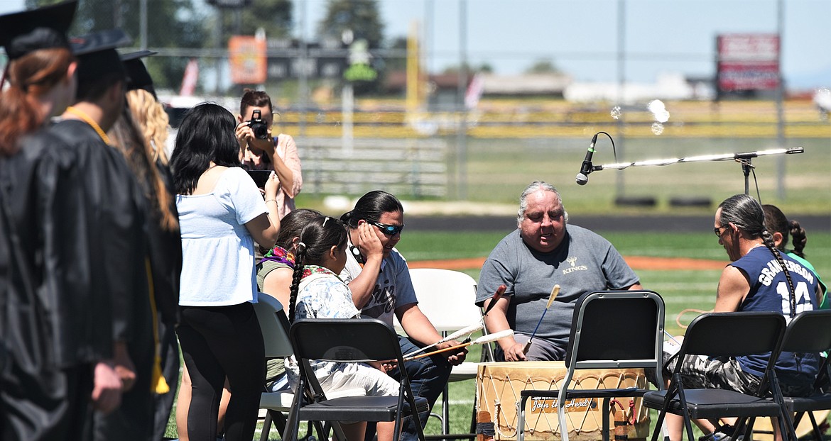 Bigcrane Drum performs an honor song near the start of the ceremony. (Scot Heisel/Lake County Leader)