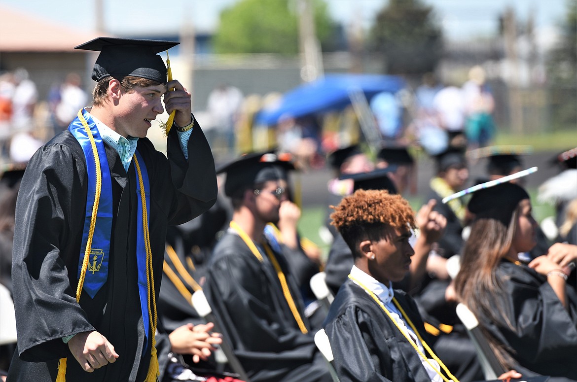 Salutatorian Tucker Lytton heads to the stage for his address. (Scot Heisel/Lake County Leader)