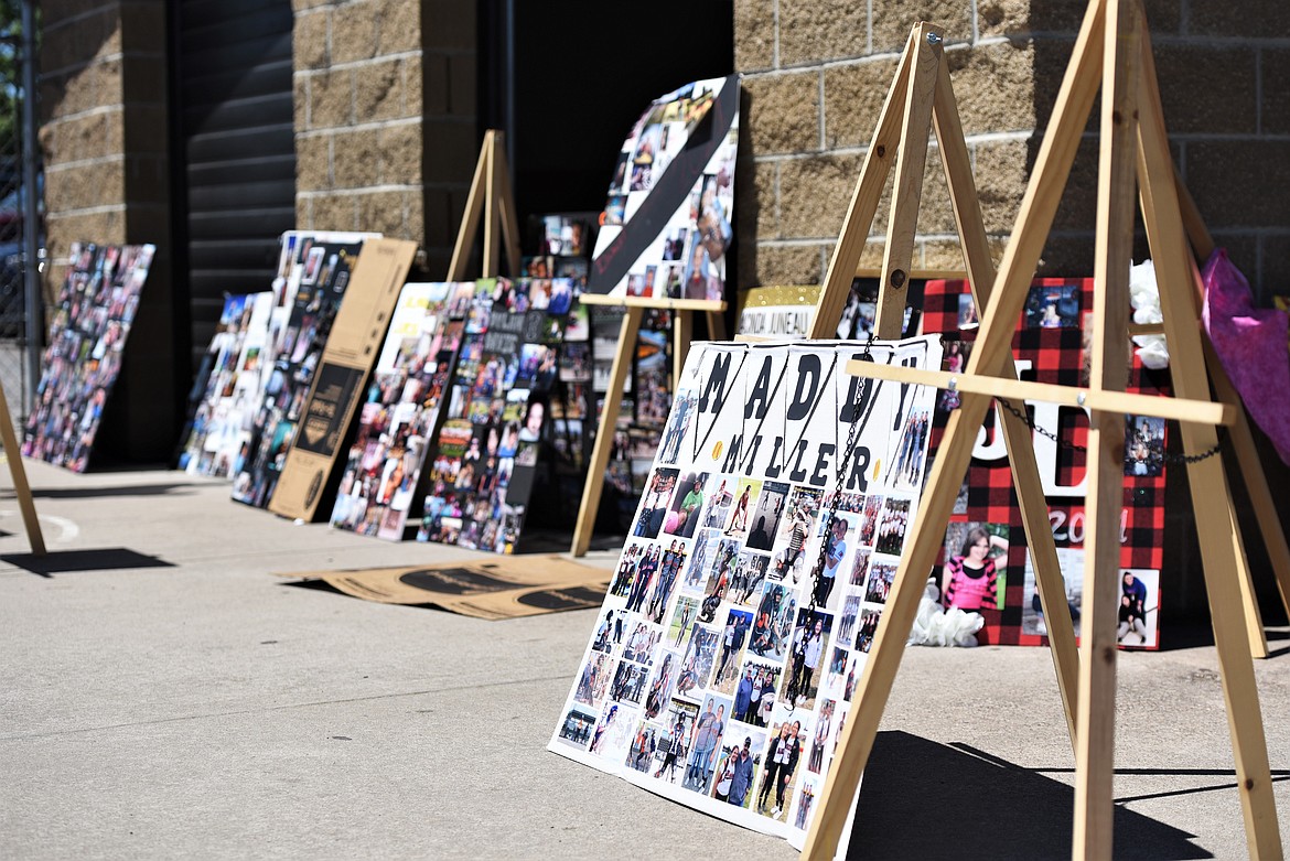 Memory boards were displayed at the entrance of the football field Sunday. (Scot Heisel/Lake County Leader)