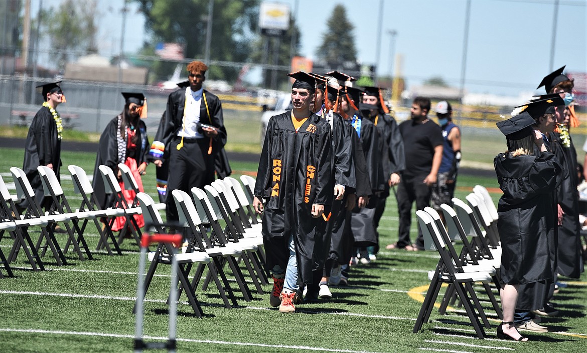 Seniors line up prior to Sunday's graduation ceremony. (Scot Heisel/Lake County Leader)