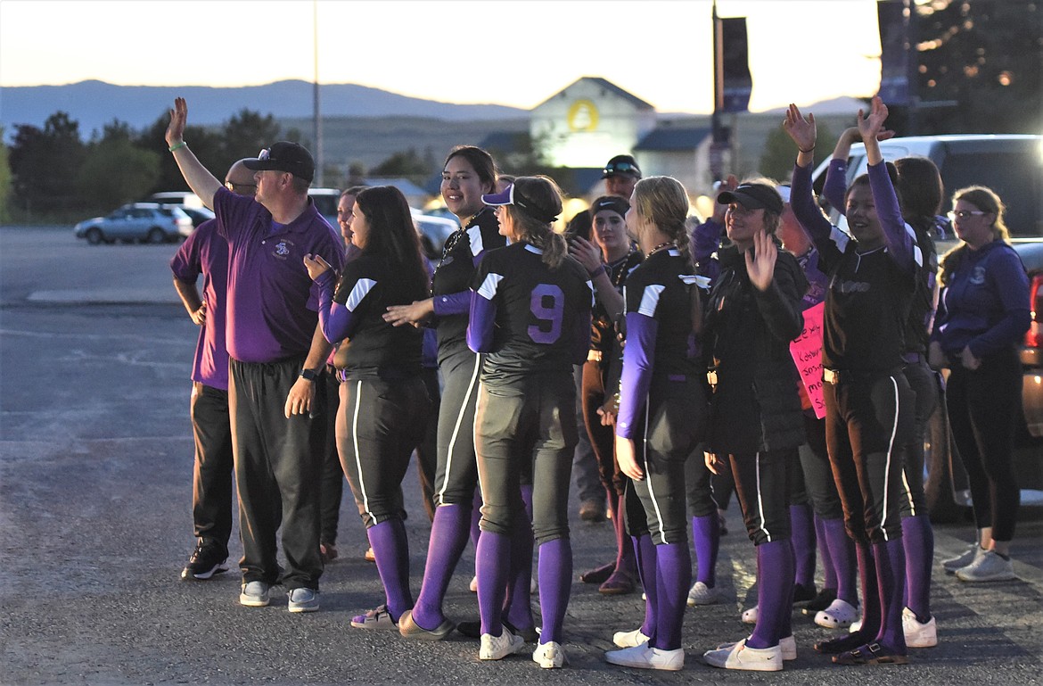 Polson softball players and coaches offer thanks to supporters Saturday night at the high school. (Scot Heisel/ Lake County Leader)