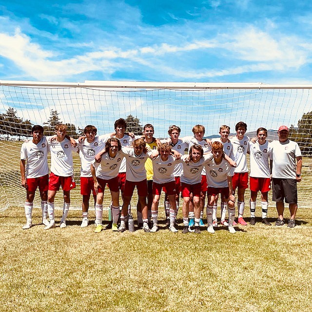 Courtesy photo
The Timbers North FC 05 Boys Red soccer team was Idaho State Cup finalists this past weekend at Simplot Sports Complex in Boise, earning the opportunity to compete June 16-20 in Salt Lake City at the USYS Far West Presidents Cup. On Friday evening the Timbers won 6-0 vs PVSC United. Cooper Prohaska started off the scoring for the Timbers and ended the game with a hat trick, scoring his third goal on a PK. Bryce Allred assisted two different goals, to Isaac Fritts and Seth Johnson. Allred also scored a goal on a PK just before the end of the first half. Miles Taylor posted the shutout as goalkeeper. Saturday morning the Timbers lost 3-2 to the Boise Timbers FC. Bryce Allred and Isaac Fritts scored the two goals for the Timbers North. Saturday evening the Timbers won 5-3 vs. BYSL IFFC. Jacob Ukich scored a goal in the first half for the Timbers. Second-half goals were scored by Cooper Prohaska, Jacob Ukich, Isaac Fritts and Ashton Ukich. Isaac Fritts and Seth Johnson each had an assist. The final game of the round robin ended in a 3-2 Timbers win vs. Idaho Rush. The first half included Markus Noble assisting Cooper Prohaska on a goal as well as Bryce Allred sending in a corner kick to Isaac Fritts for the Timbers. In the second half, Griffyn Rider assisted Isaac Fritts on a goal. In the front row from left are Jacob Ukich, Chet Hanna, Nathaniel Wyatt, Markus Noble and Caden Thompson; and back row from left, Sebastian Baker, Ethan Wood, Cooper Prohaska, Stirling Roget, Miles Taylor, Griffyn Rider, Bryce Allred, Isaac Fritts, Ashton Ukich, Seth Johnson and head coach Mike Thompson. Not pictured is Landon Lee.