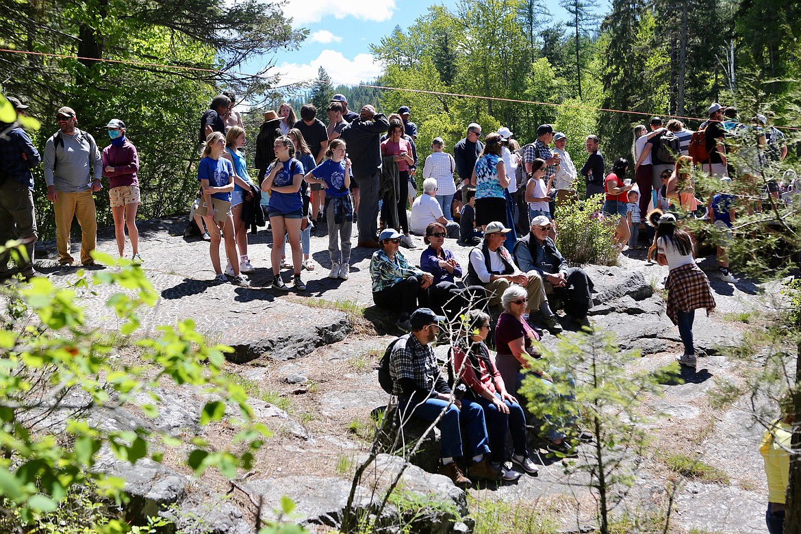 Spectators gather at the Big Rock along the Swan River Nature Trail to catch the action at the Bigfork Whitewater Festival last Saturday.
Mackenzie Reiss/Bigfork Eagle