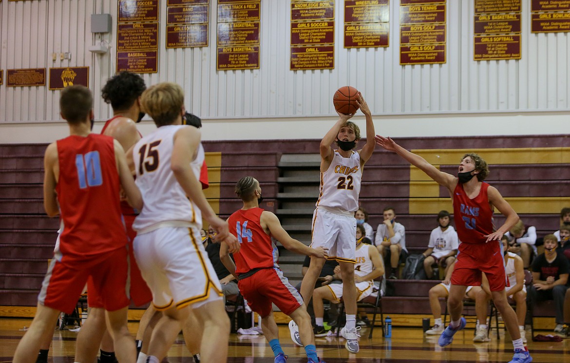 Moses Lake High School's Tyler Nordberg fires a three from the corner for the Chiefs in the second half of the 57-39 defeat to West Valley on Tuesday night at home.