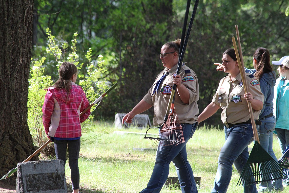 Scout leaders helping to organize the cleanup party