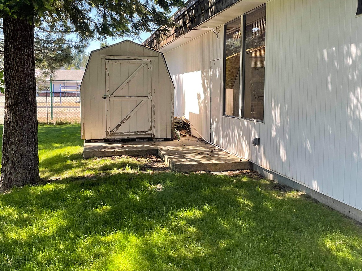 The area behind the Pinehurst Library where the smoking juveniles/alleged burglars were seen on camera. The post from the library on Facebook was a key factor in the burglars being caught.