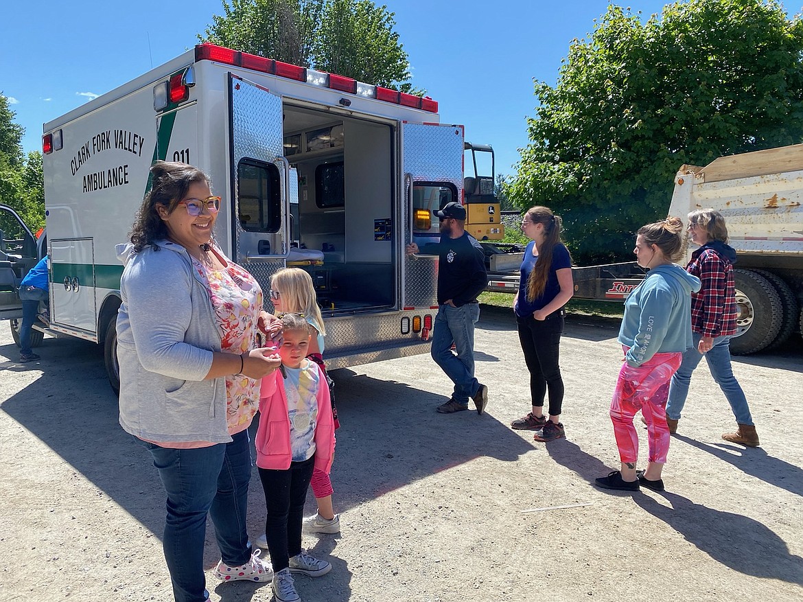 Children and families get to check out the ambulance up close and personal at the Hope Preschool Family Day.