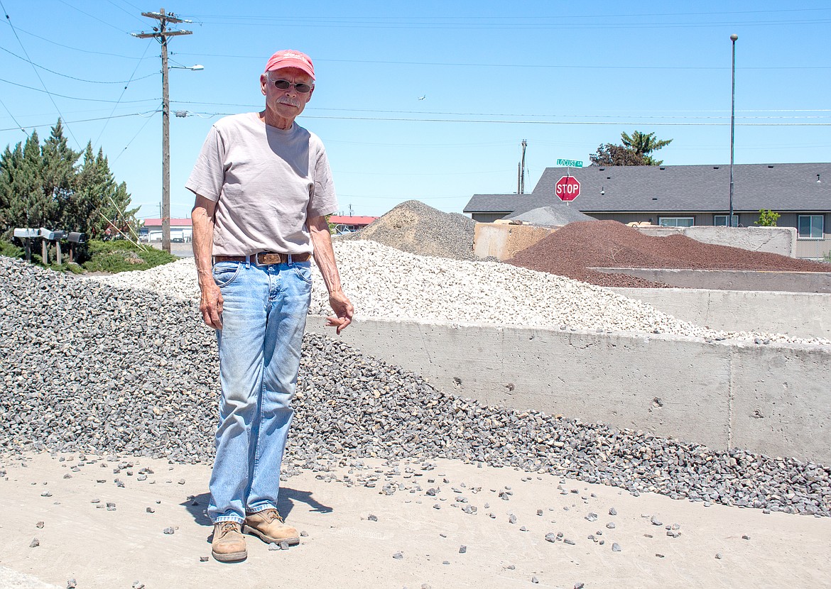 Basin Bark owner Dave Jones stands in front of some of the rock options available at his landscape supply company in Moses Lake on Wednesday afternoon.