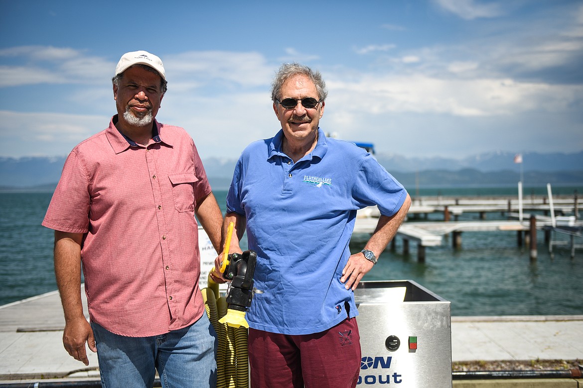 Joel Eddins, left, general manager of Flathead Harbor at Lakeside, and Bruce Young with the Flathead Lake Protection Association are pictured at the marina. (Casey Kreider/Daily Inter Lake)
