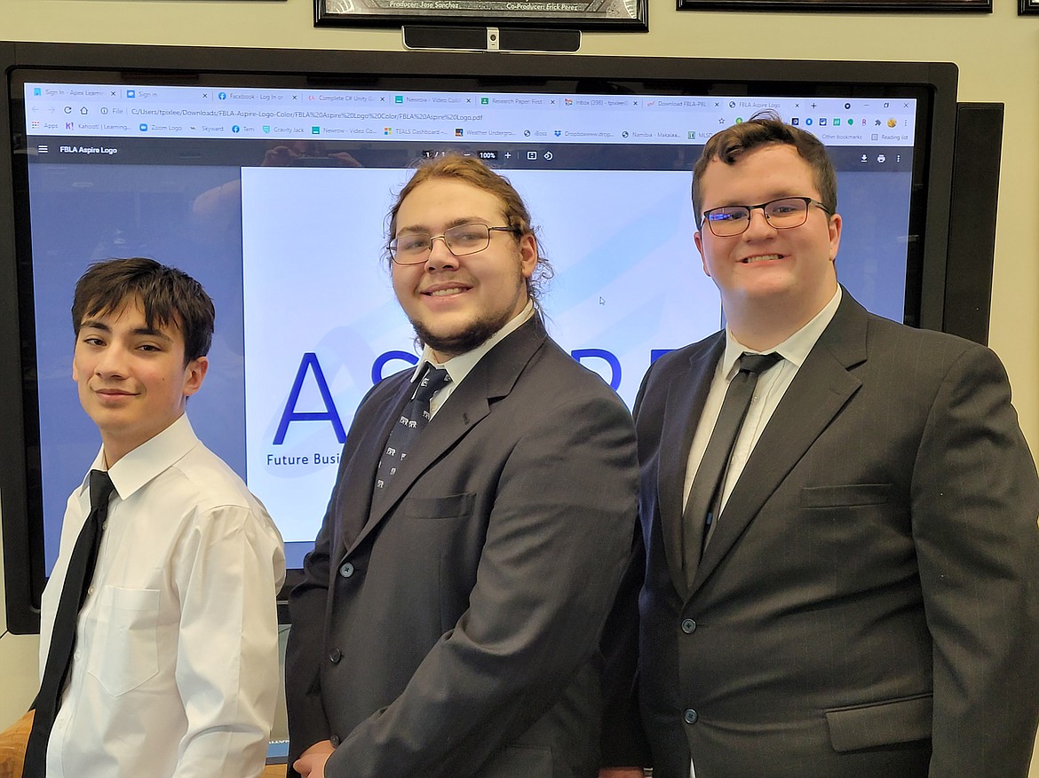 (From left) Andrew Pannullo, Mikey Ruffle and Logan Beck qualified for FBLA nationals with a third-place finish in state competition in the computer game and simulation category.