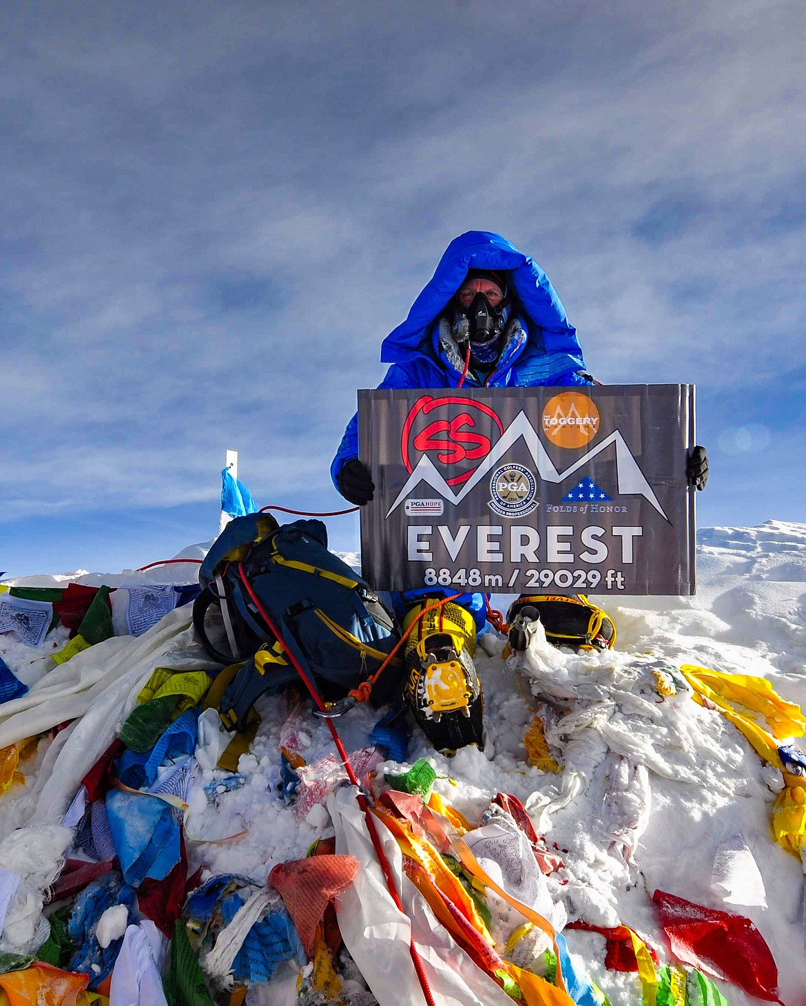 Steve Stevens celebrates at the top of the world, 29,029 feet above sea level on the summit of Mt. Everest, on May 12. (Photo courtesy of Steve Stevens)