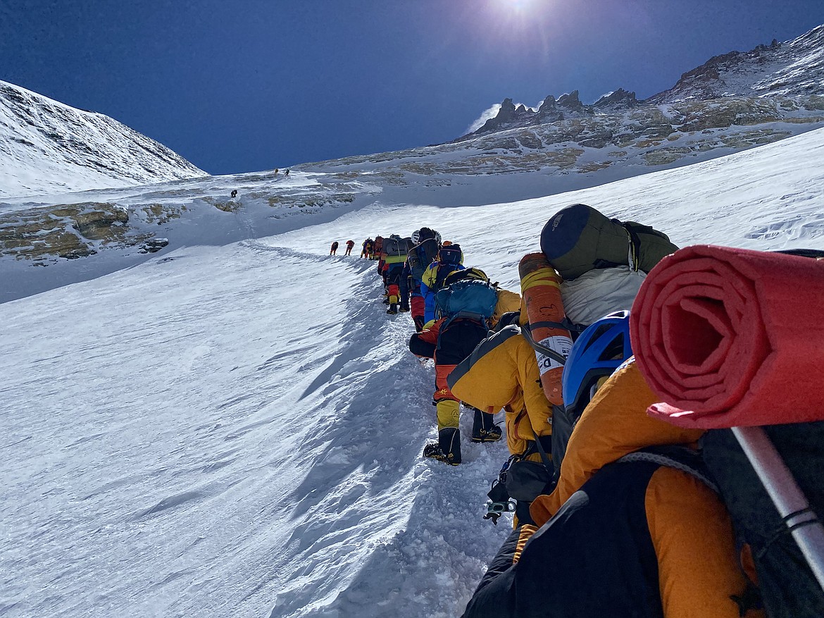 Climbers pass the Yellow Band on their journey from Camp III to Camp IV on Mt. Everest. (Photo courtesy of Steve Stevens)