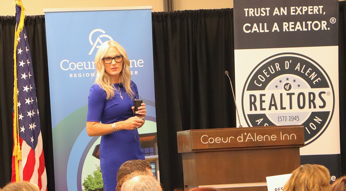 Jennifer Smock of Windermere / Coeur d'Alene Realty, Inc. gave attendees at the "Navigating the Wild Wild West - the Growth of Kootenai County" hard facts on developments in the real estate industry. Photo courtesy the Coeur d'Alene Regional Chamber of Commerce.