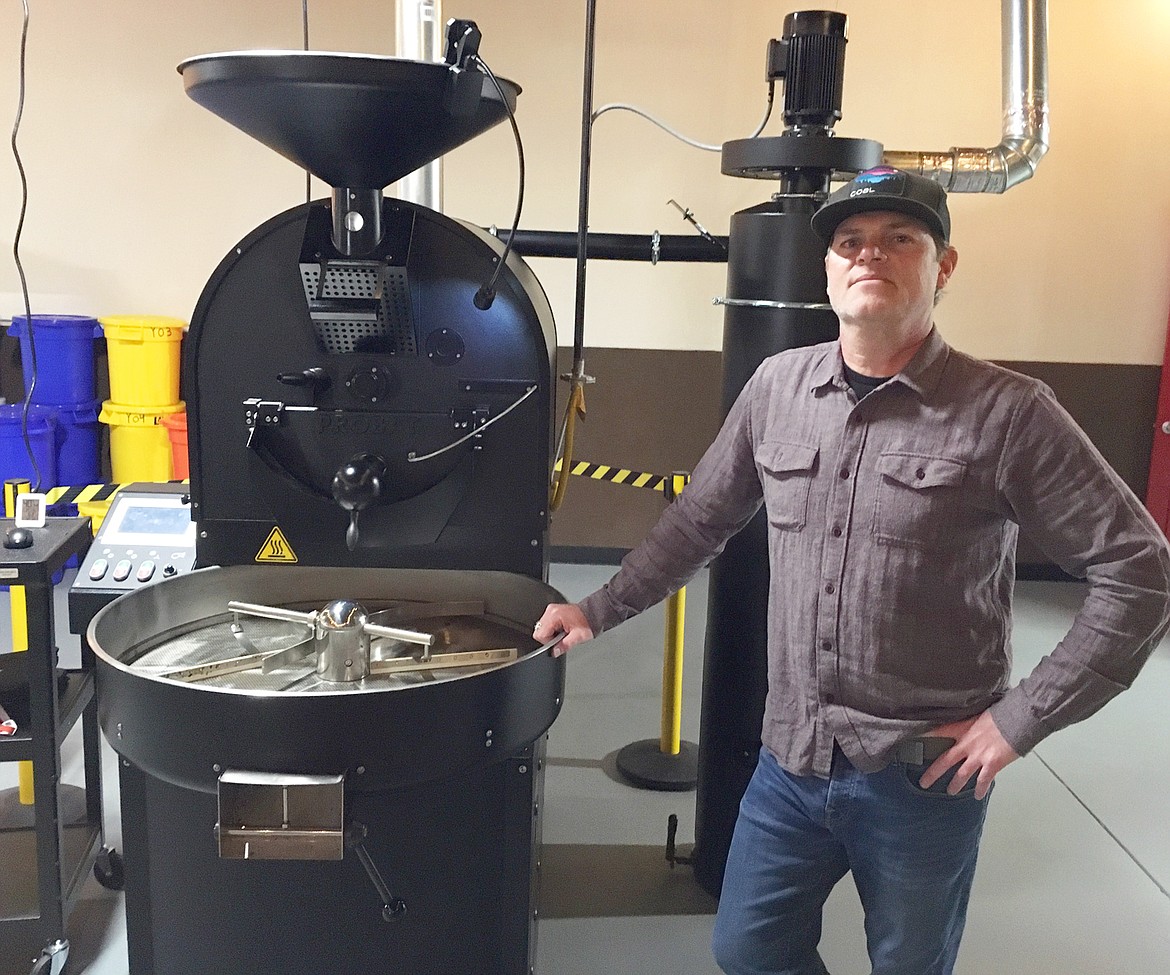 Jason Kilmer stands by the Probat coffee roaster at Tubbs Coffee Roasters.