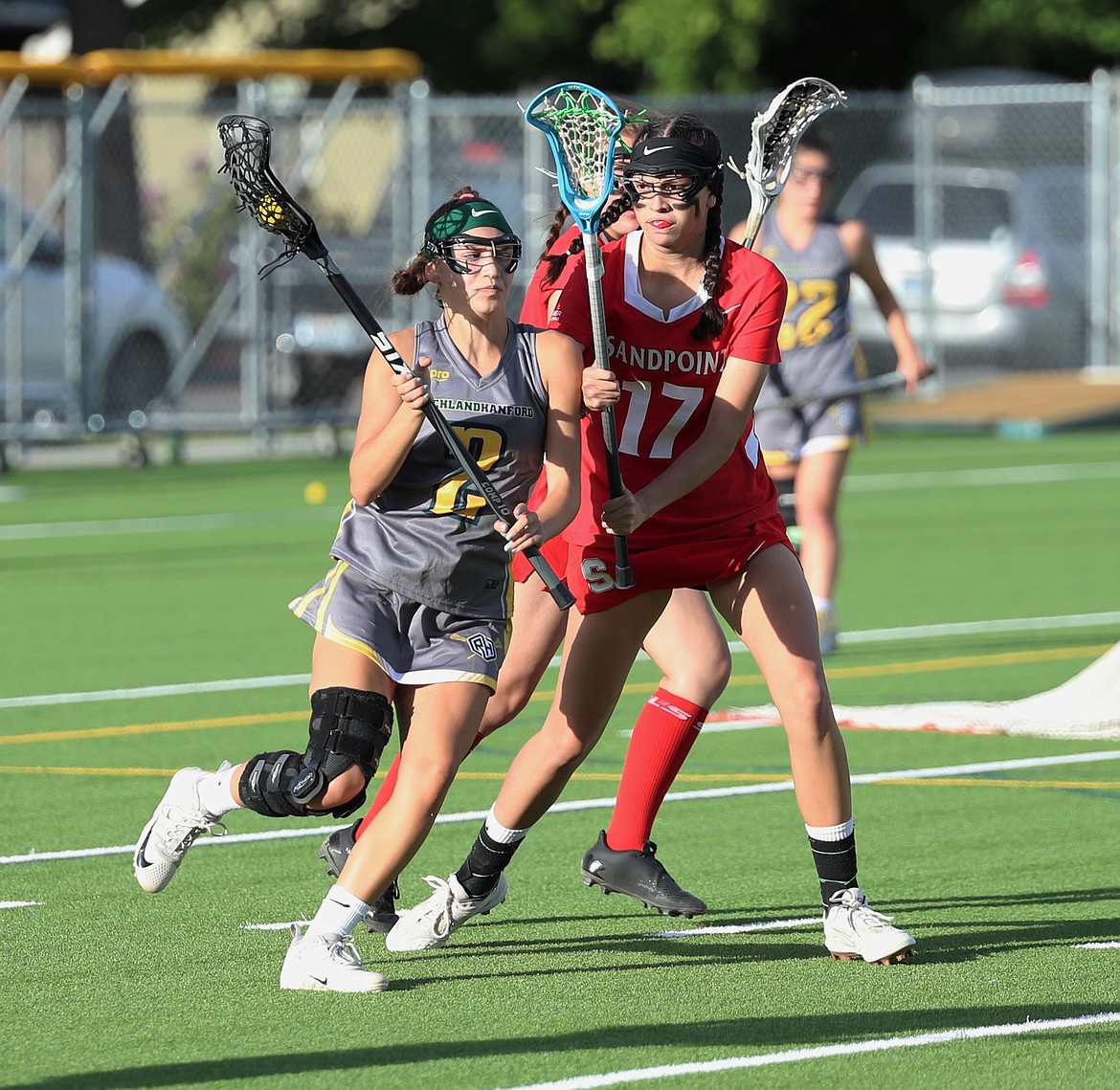 Kennedy Phillips defends a Richland-Hanford player on Friday.