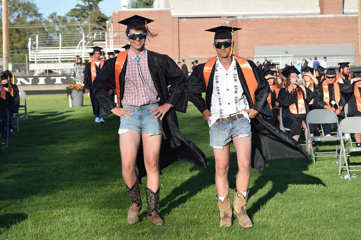 A pair of seniors during the procession at Ephrata High School’s 2021 graduation ceremony on Friday.