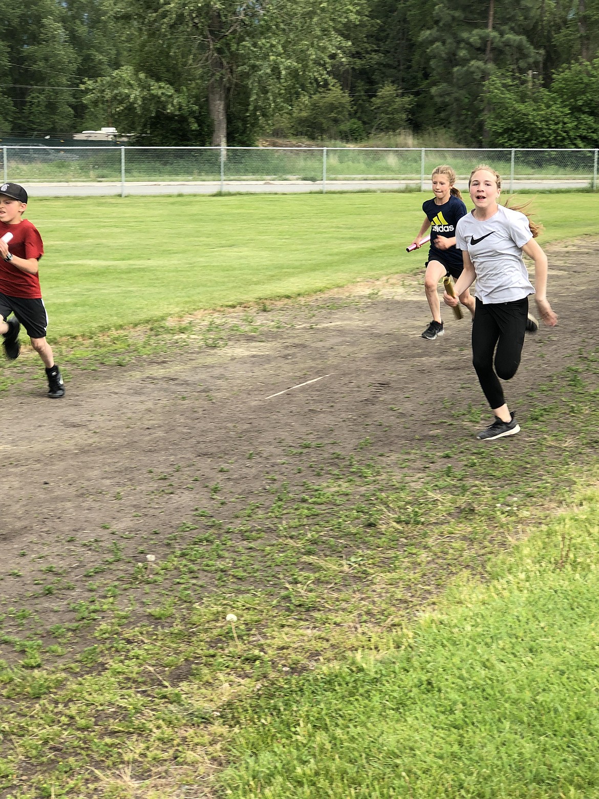Troy Elementary School students participate in a track meet to raise money for new track and field facilities for the district. The facilities are in dire need of renovation and due to their condition, the district has not been able to host home track meets in recent years. (Courtesy photo)