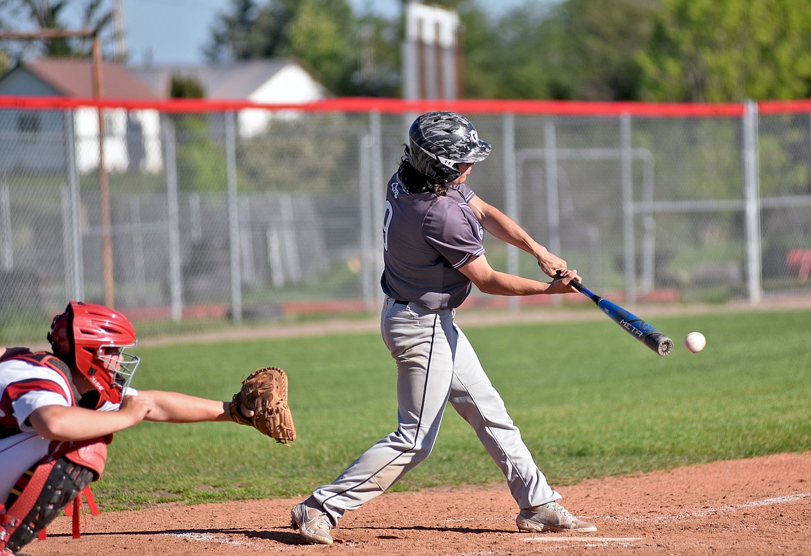 Glacier Twins' Taylor Bryan connects with a ball for a hit during a game against the Kalispell Lakers A on Wednesday, June 2 in Kalispell. (Whitney England/Whitefish Pilot)