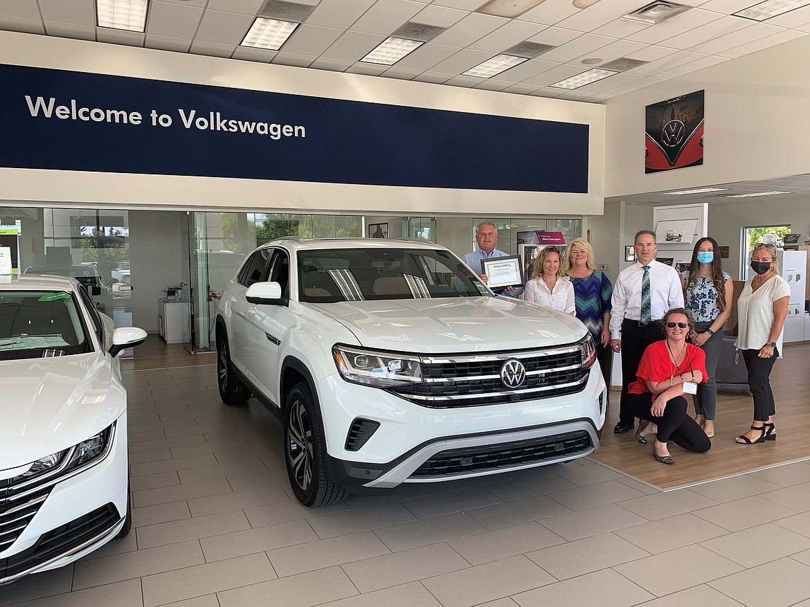 Post Falls Chamber of Commerce June Member of the Month: Post Falls Volkswagen, 811 N. Greensferry Road, Post Falls. Pictured with members of our Ambassador Committee.