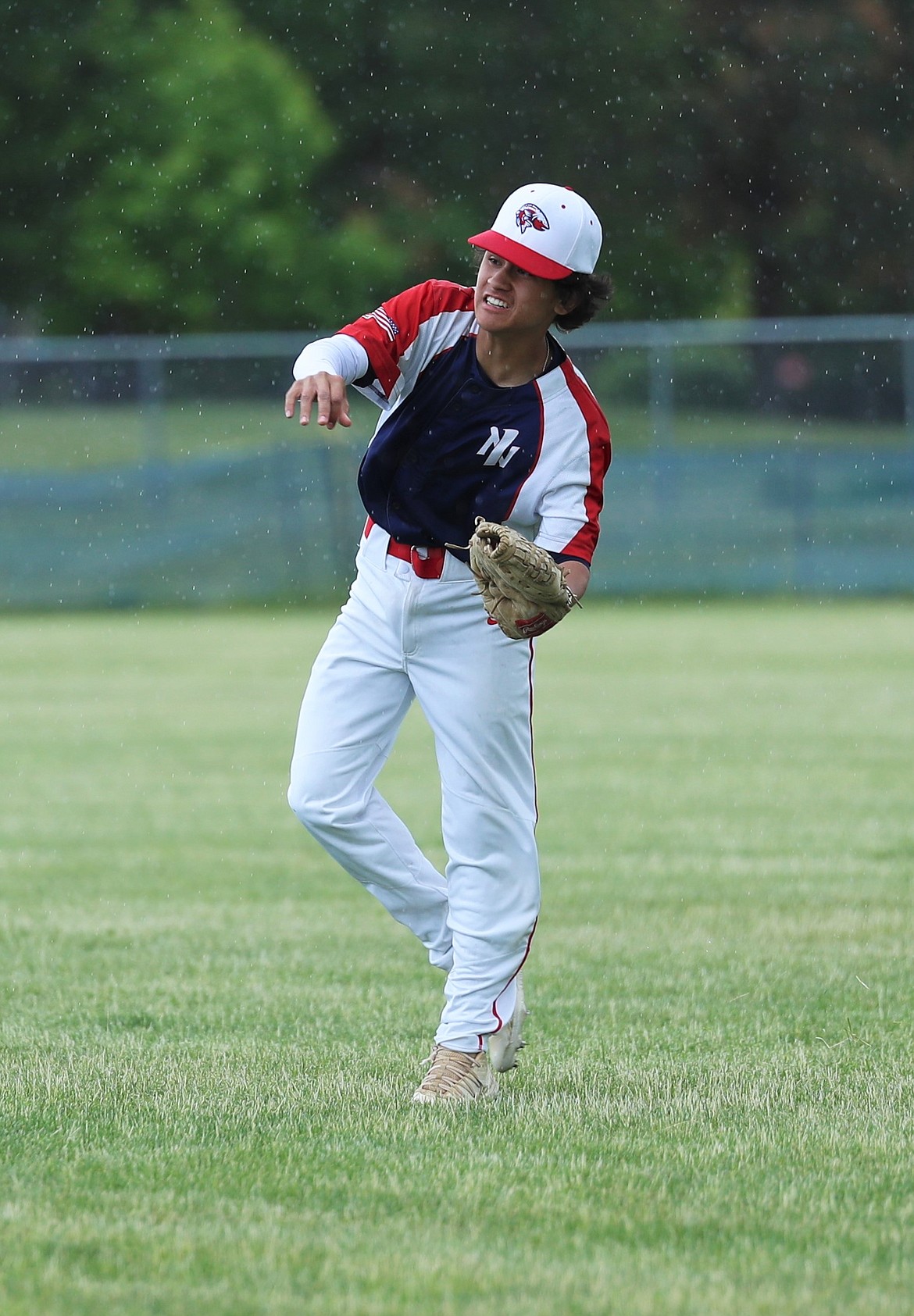 Kaipoi Wong-Yuen makes a throw from the outfield during Saturday's doubleheader.