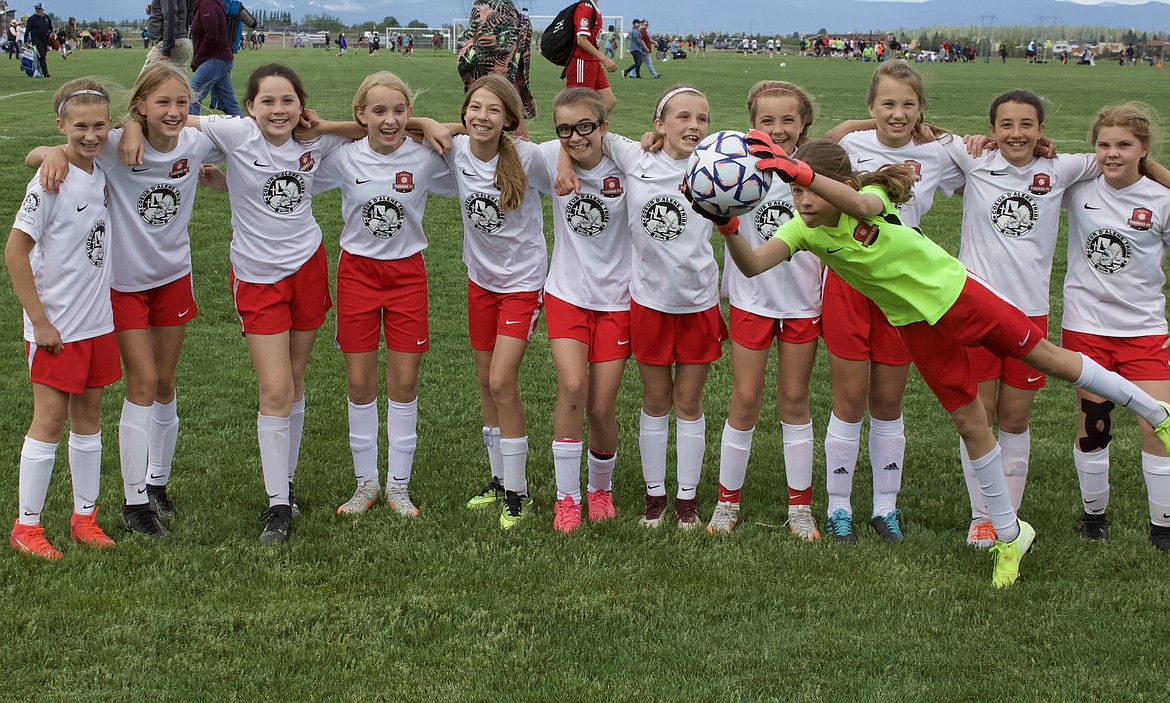 Courtesy photo
The 2009 Thorns Green closed out its spring season with the 3 Blind Refs Tournament in Kalispell, Mont., this past weekend. Thorns goals were scored by Aspen Lilliard, Ava Roberts, Katie Kovatch, and Ryann Blair, with Savannah Spencer in goal. From left are Aspen Lilliard, Ava Roberts, Phinalley Voigt, Katie Kovatch, Eliza Murphy, Caleigh Stevenson, Sierra Sheppard, Tayla Ruchti, Zaria Metts, Haven Dye and Ryann Blair, and in front, goalkeeper Savannah Spencer.